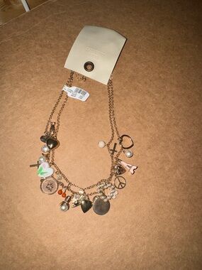 Gold-Tone Multi Charm Necklace with Hearts, Pearls & Symbols